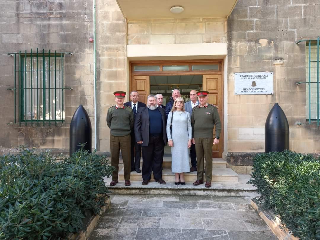 Malta Veterans Association representatives with Armed Forces of Malta personnel outside Armed Forces headquarters